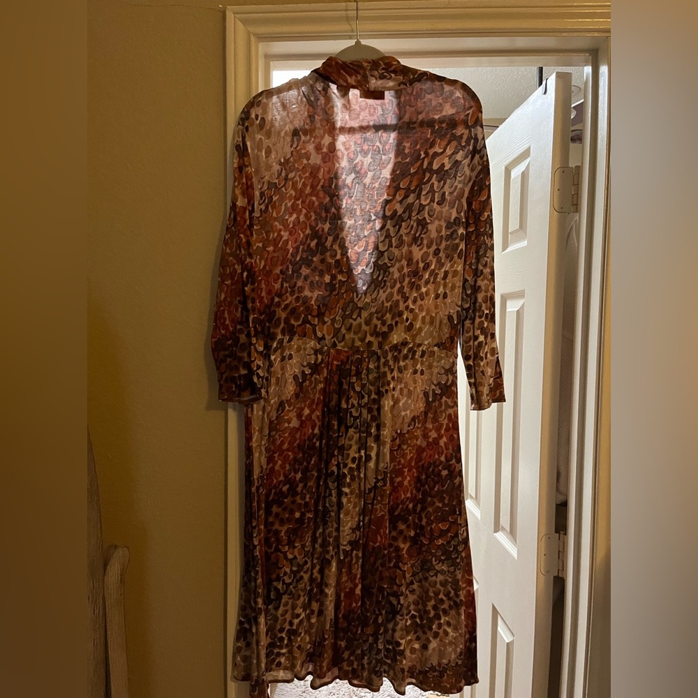 Dress to wear for a night out. Low cut with a sexy bosom cut
